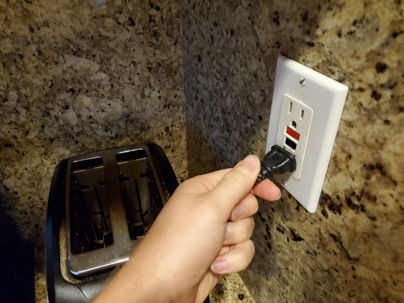 Plugging In Electrical Cord